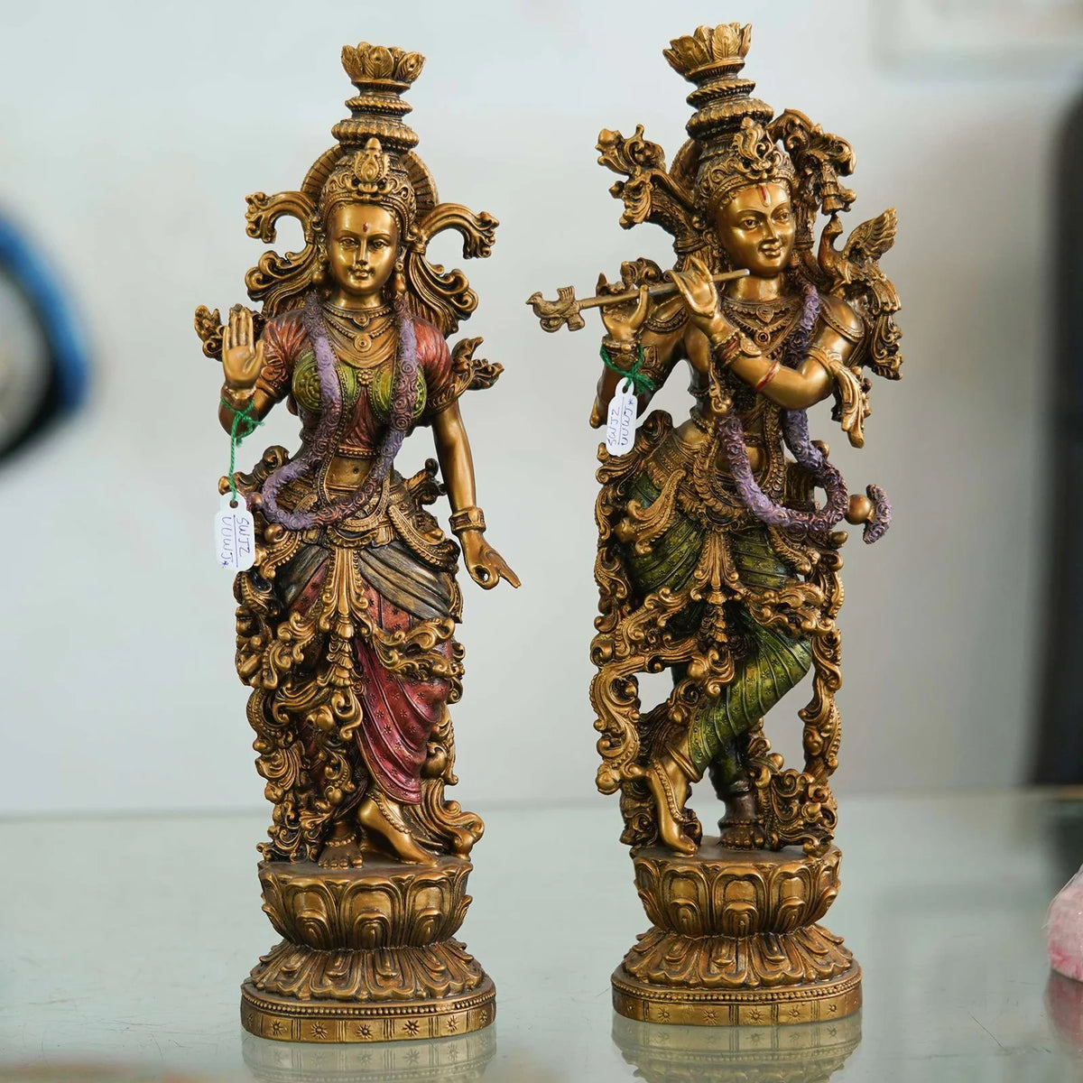 Pair of Brass Statues: Man Playing Flute and Woman Holding Flower - TN Creations